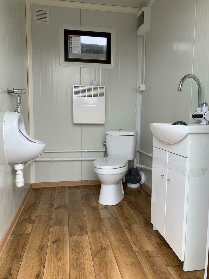 Contentor sanitário duplo com tanque de resíduos.